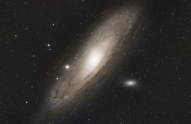 The Andromeda Galaxy surrounded by a dense star field