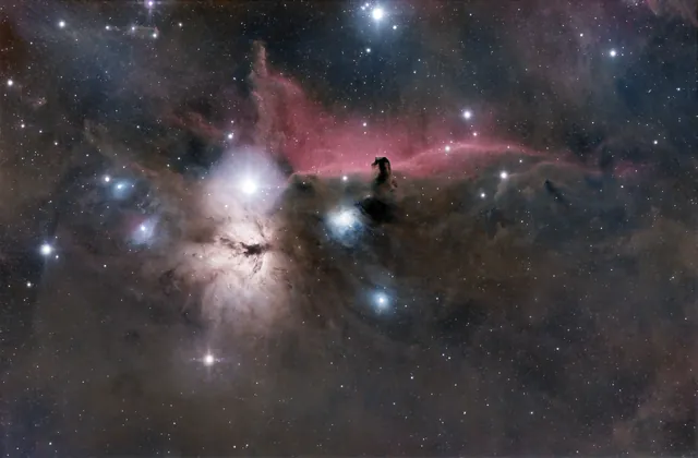 The dark Horsehead Nebula against red emission nebulosity