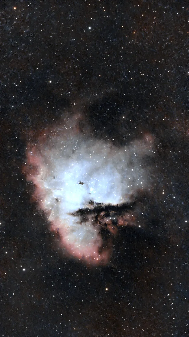 The Pacman Nebula surrounded by stars
