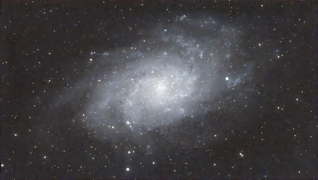 The Triangulum Galaxy surrounded by stars